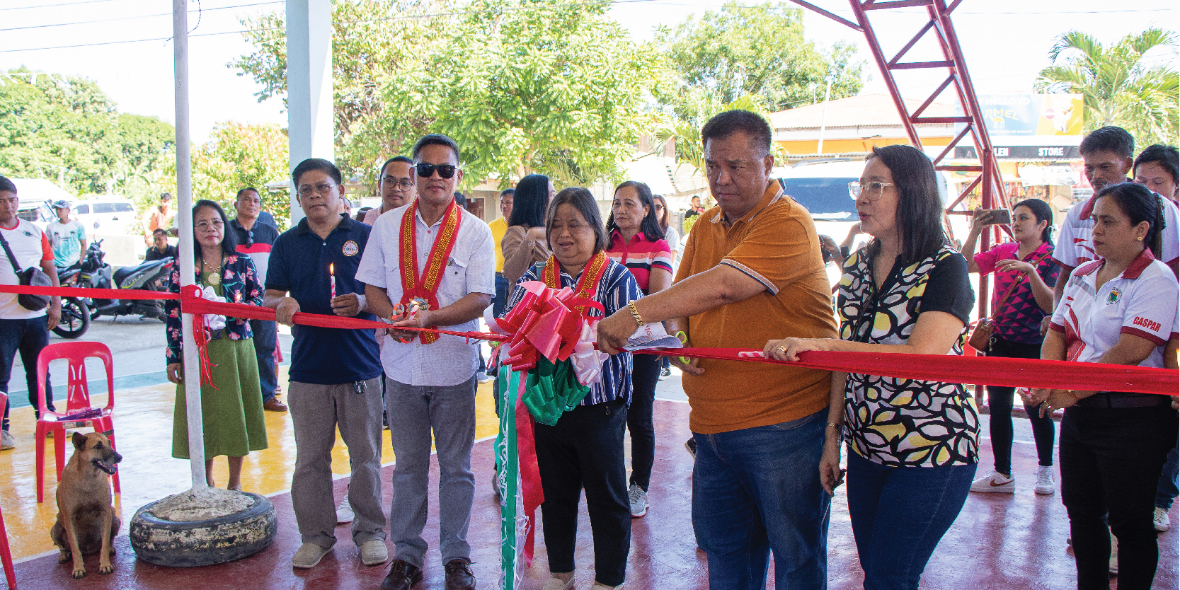 MLGOO Santos, ARD Durwin, PD Urmatam, Mayor Trinidad and Vice-Mayor Trinidad pause for a photo op before the ceremonial ribbon cutting.