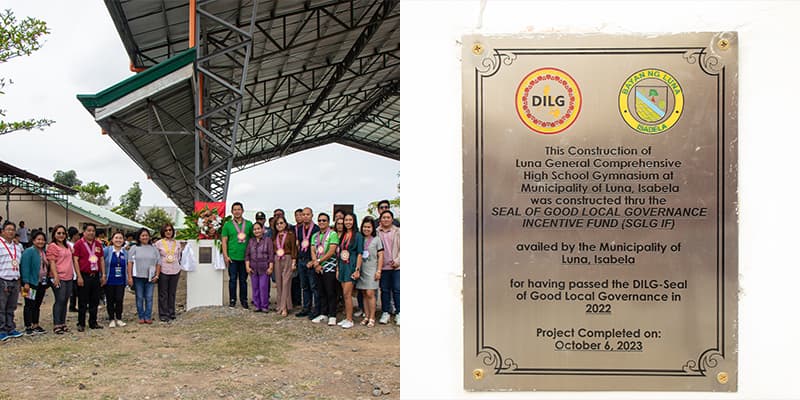 LGU elective officials, LGCHS faculty, and DILG representatives pose for a group photo where the SGLG-IF marker was placed.